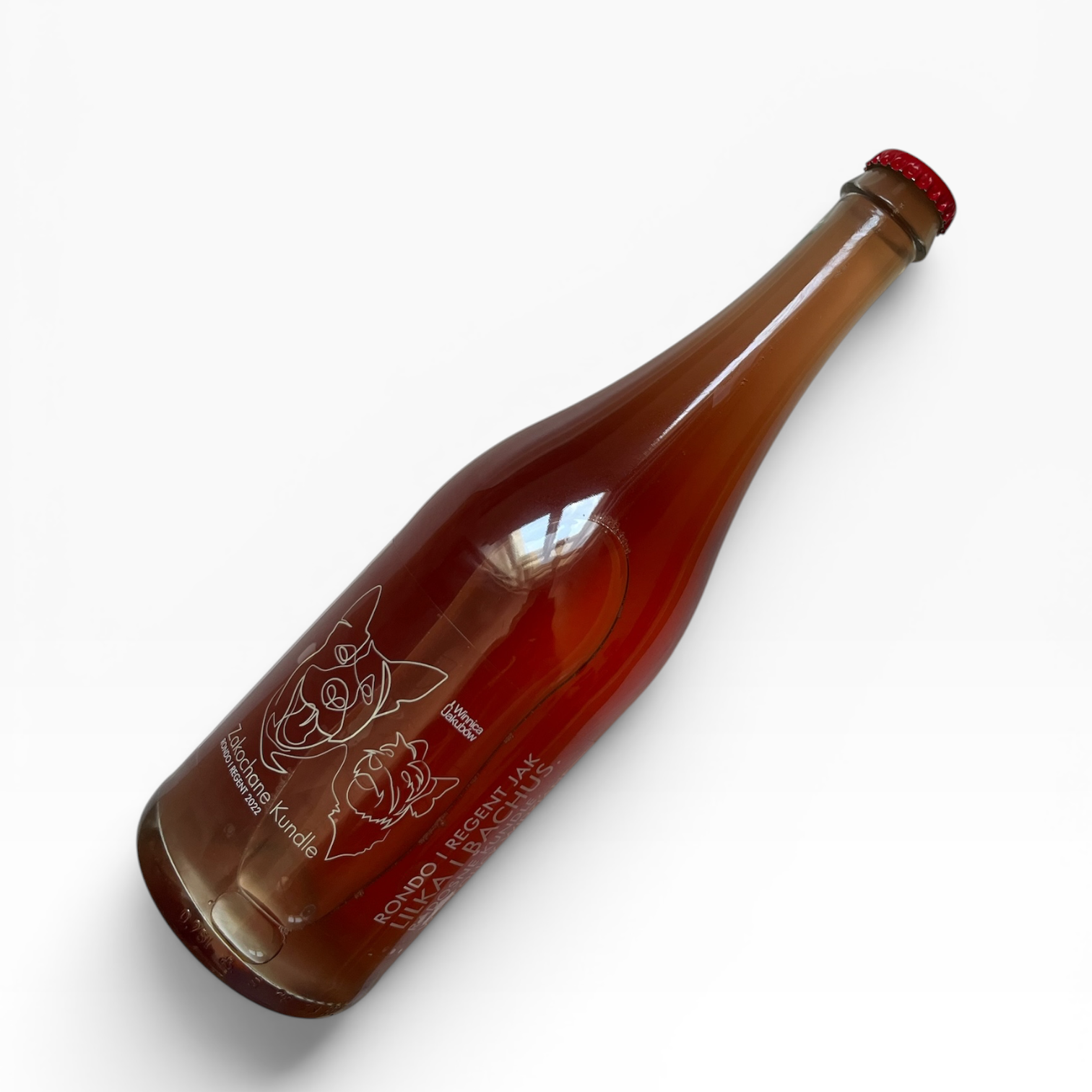 Brown bottle with a red cap on a white background