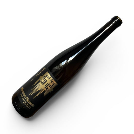 Wine bottle with a gold label on a white background